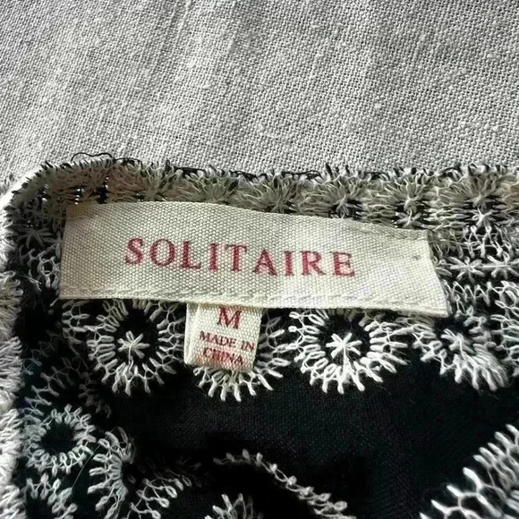 Solitaire crochet top black and white Exc condition. Loose elastic sleeve size M - Picture 12 of 15